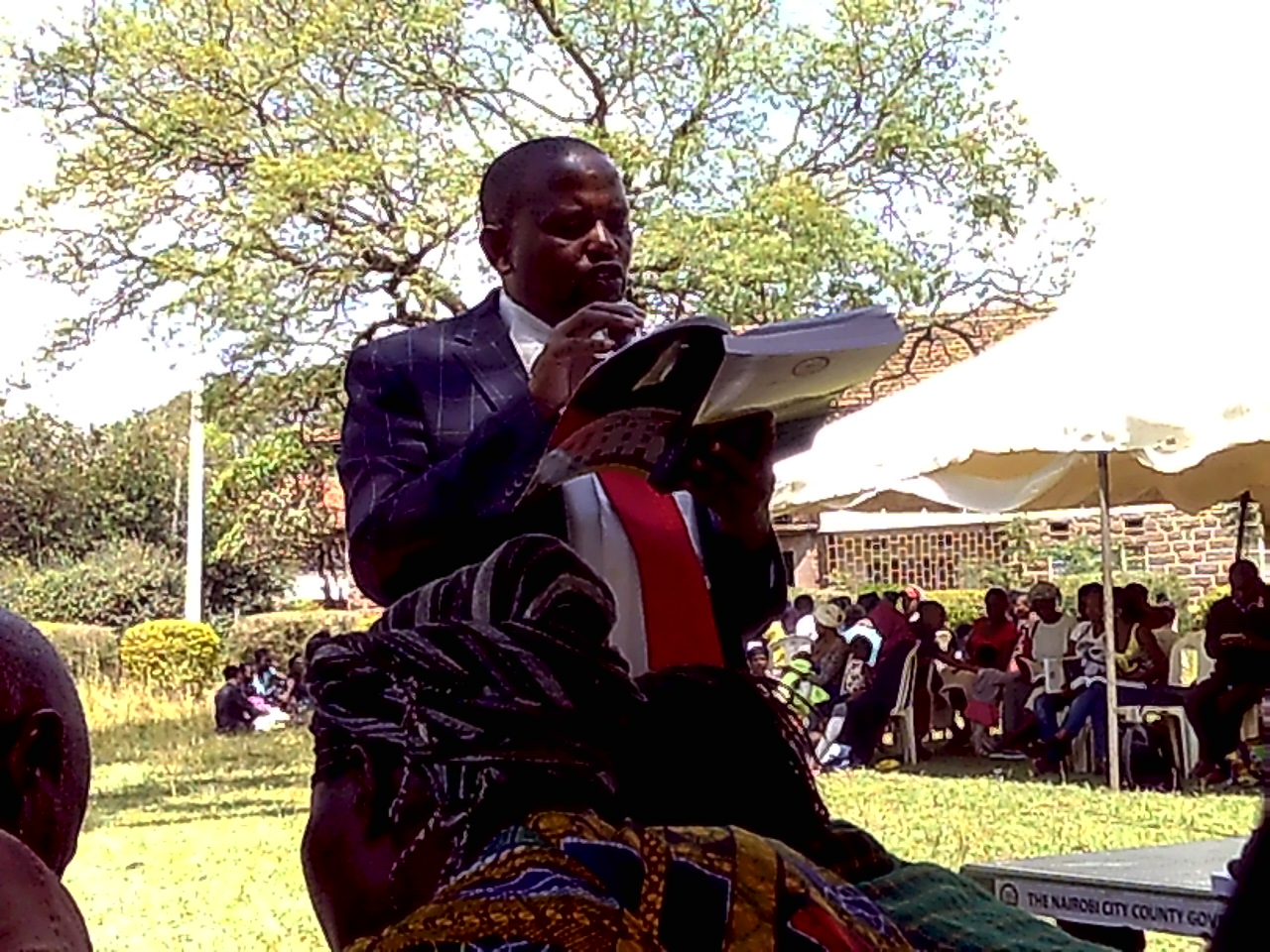 Nairobi County Official presiding over the public participation forum at Joseph Kangethe Woodley 