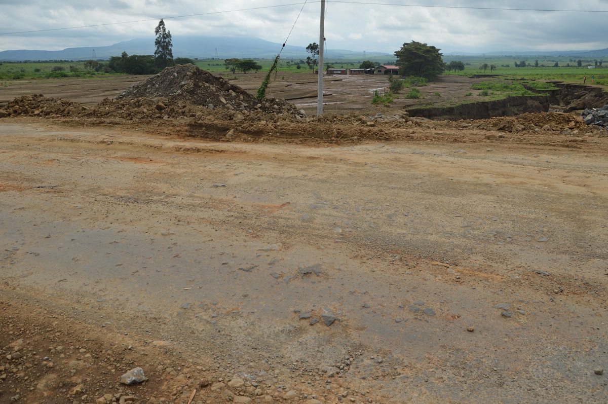 Photo 6: This is the Narok-Nairobi road after the fault line was filled with huge stones and sand. 
