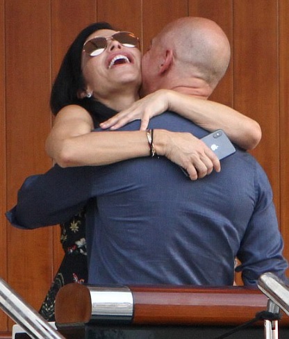 Jeff Bezos and Lauren Sanchez put on a public display of love as they kiss and cuddle during a trip to Venice on a yacht