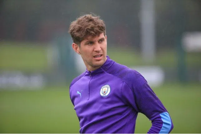 Manchester City defender John Stones suffers an injury