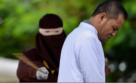 Man who advocated caning for adultery gets caned for sleeping with a married woman
