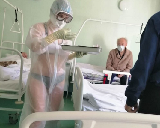 Russian nurse punished for wearing bra & panties only under a transparent PPE gown