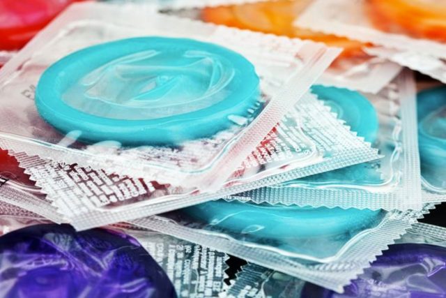 A store employee refuses to sell condoms to a customer to express religious objections