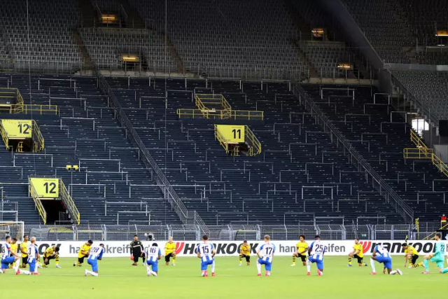 Dortmund and Hertha Berlin take a knee before Bundesliga clash