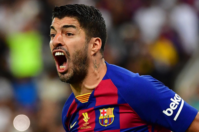 Atletico sign striker Luis Suarez from Barcelona