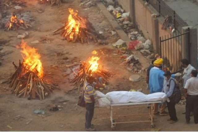 India’s crematoriums overwhelmed as Covid-19 kills people