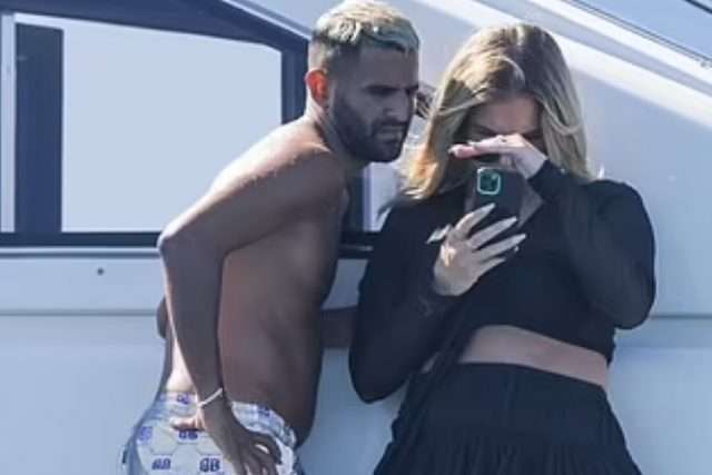 Riyad Mahrez, 30, of Manchester City holidays on a yacht in Spain with fiancée Taylor Ward, 23