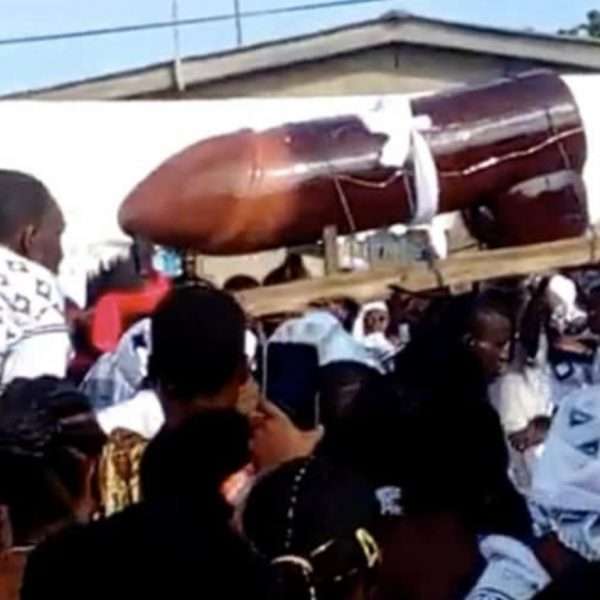 Woman who had 10 children with 10 different men buried in a penis-like coffin