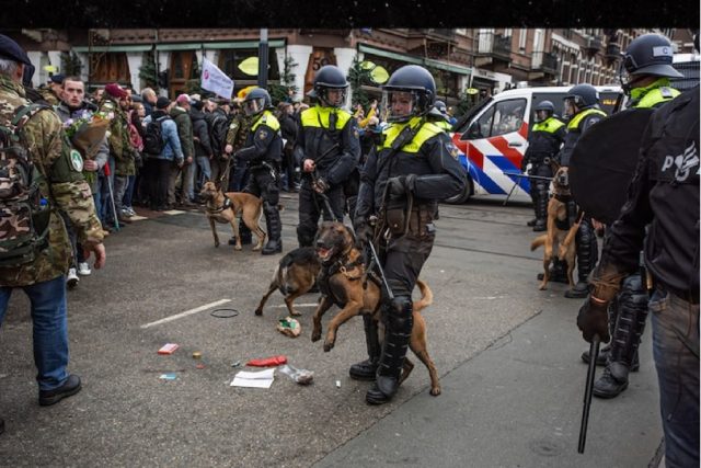 Police in Amsterdam control anti-lock-down protests using dogs and batons