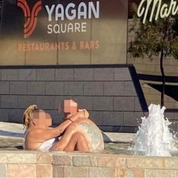 Couple seen having sex in front of restaurant in public