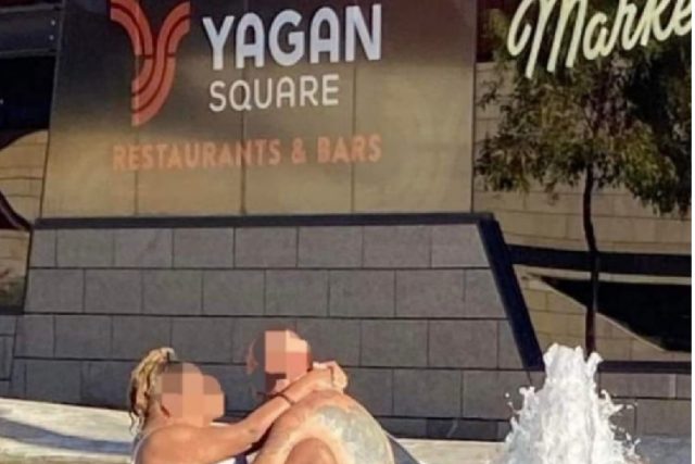 Couple seen having sex in front of restaurant in public