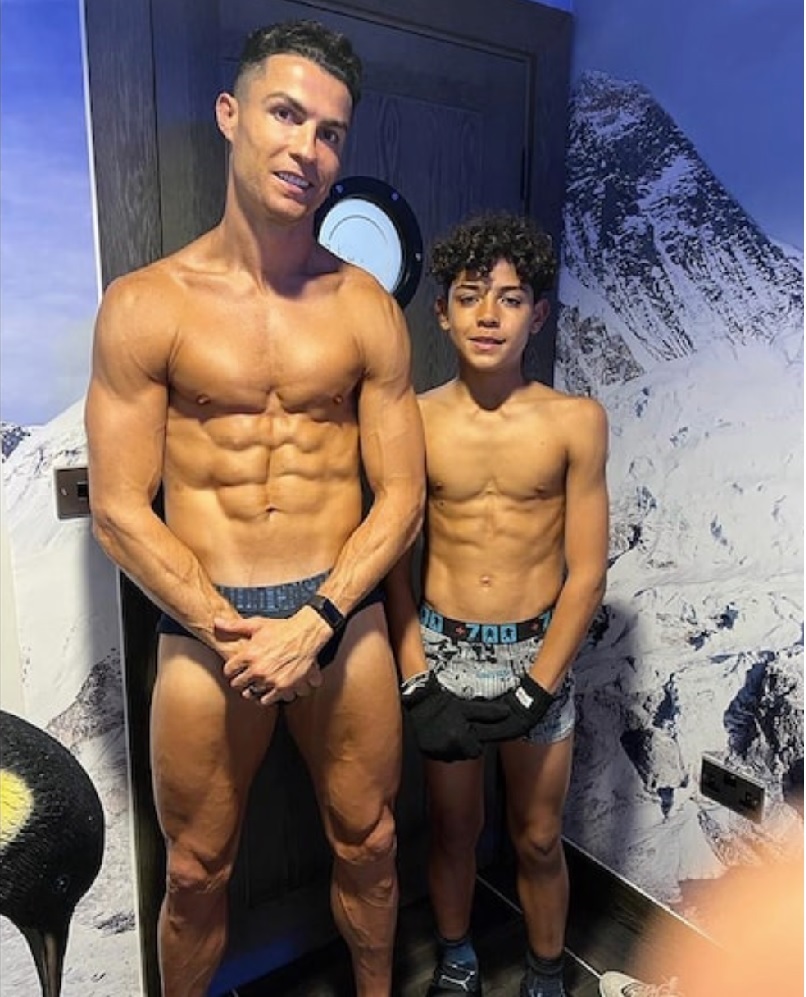 Cristiano Ronaldo showcases his washboard abs while lying on a trio of  Christian Dior cushions