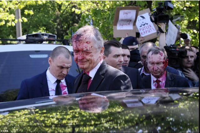 Russian ambassador to Poland has been doused in red paint and was branded a ‘fascist’ by pro-Ukraine activists over Ukraine’s invasion