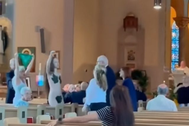 Abortion rights activists strip naked during church service in pro-choice protest