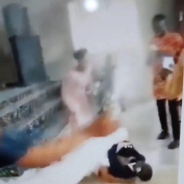 Couple fall to the ground after groom ‘dived’ to kiss his bride during their wedding (video)