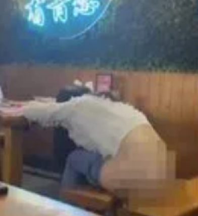 Drunk woman strips naked and urinates in the middle of a restaurant