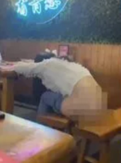 Drunk woman strips naked and urinates in the middle of a restaurant